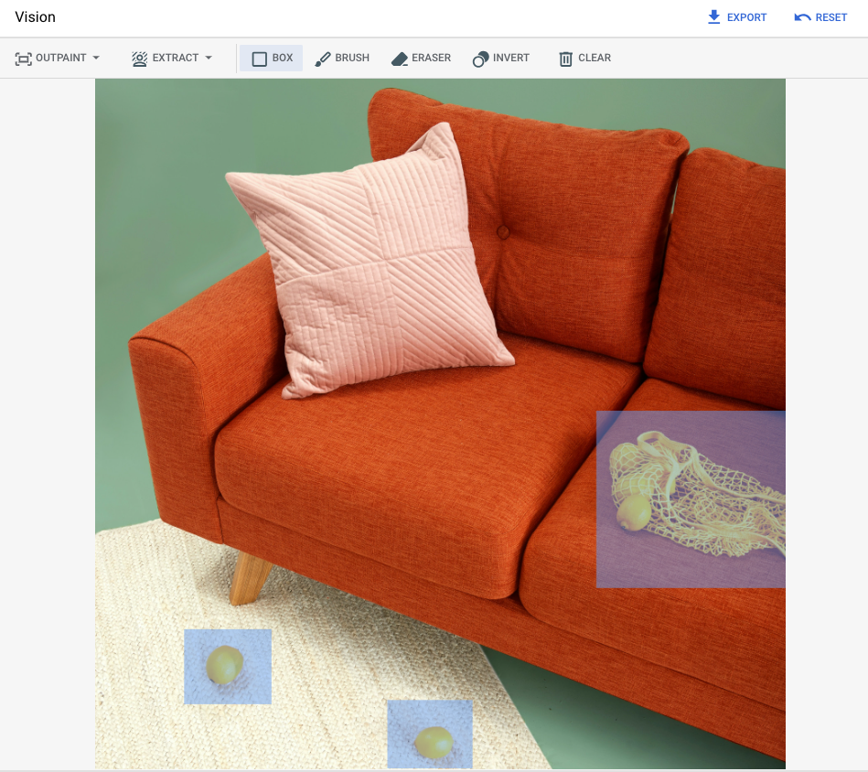 The sample base image of the red couch is depicted, with masked
           areas defined for the bag of lemons on the couch and two lemons on
           the rug.