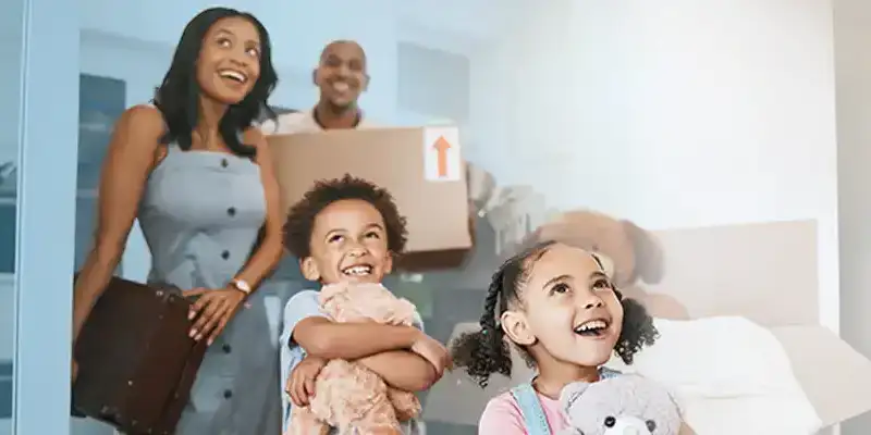 Smiling moving into new home